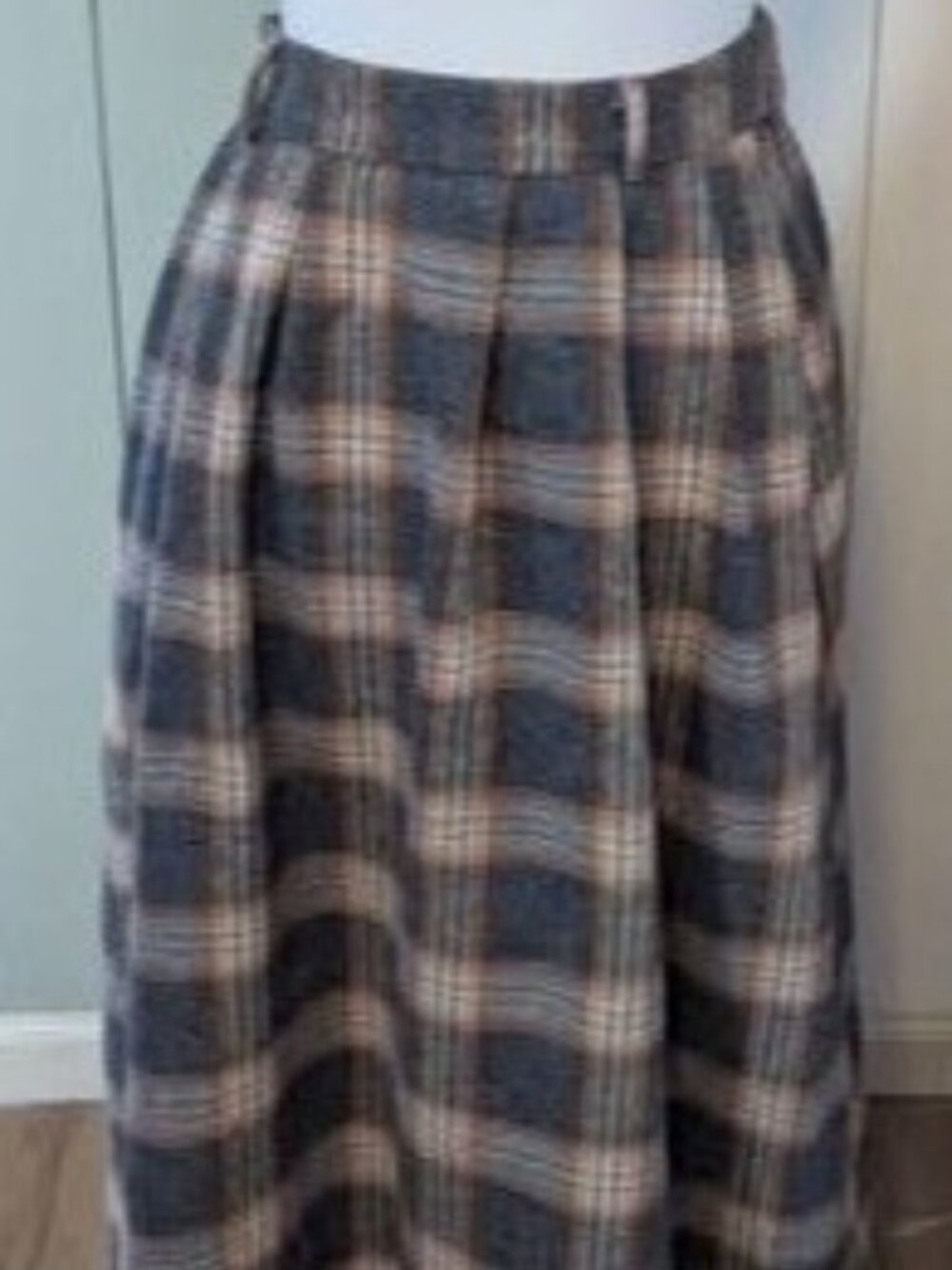 Black & tan Dazy plaid maxi skirt with elastic waist & hidden side zip.
